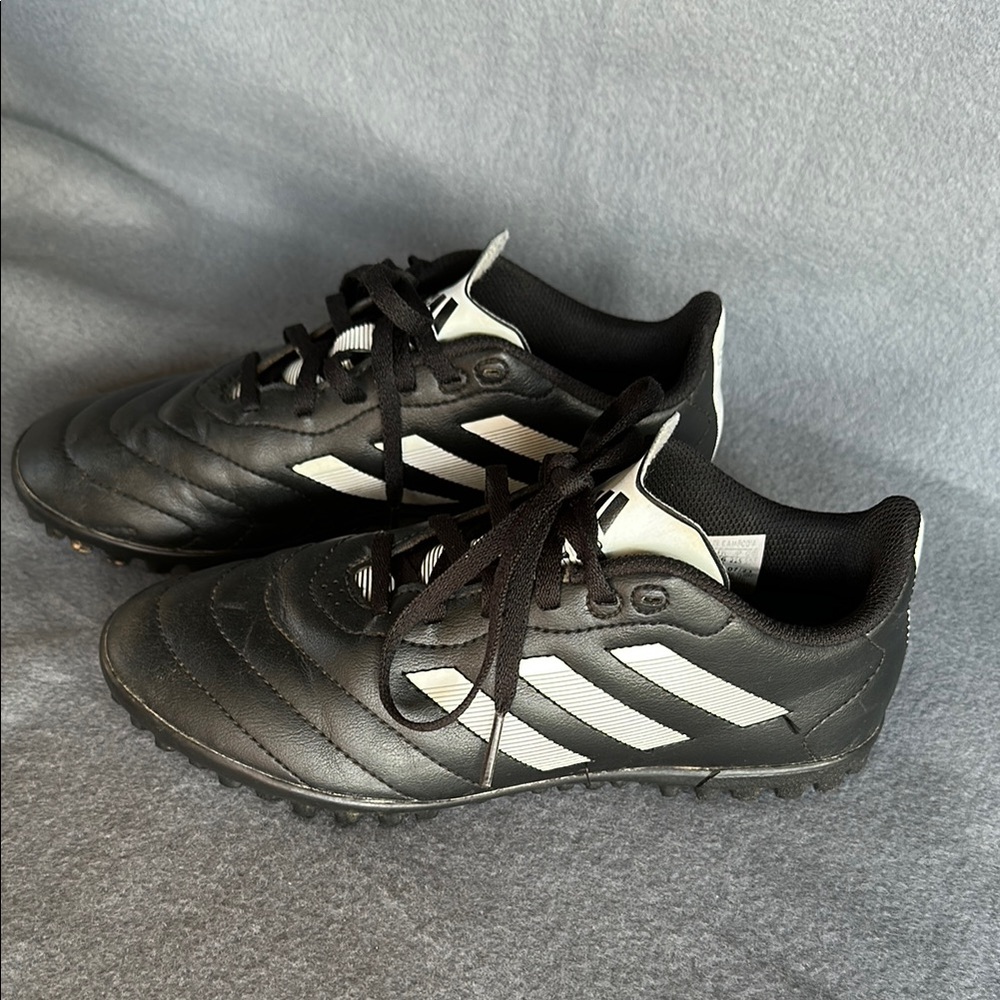 Adidas Black and White Turf Shoes for kids